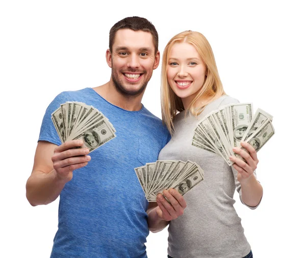 depositphotos 41578587 stock photo smiling couple holding dollar cash